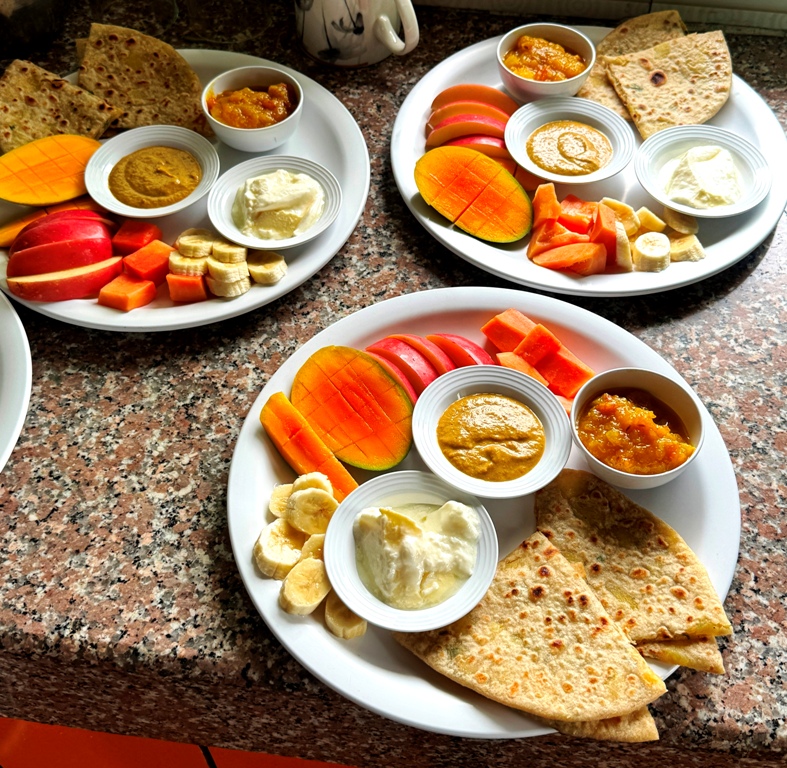 Organic vegetarian food served at yoga retreat in Nepal with cultural cooking class