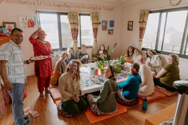 Group yoga retreat in Kathmandu valley at Niru Yoga Homestay with mountain and forest view